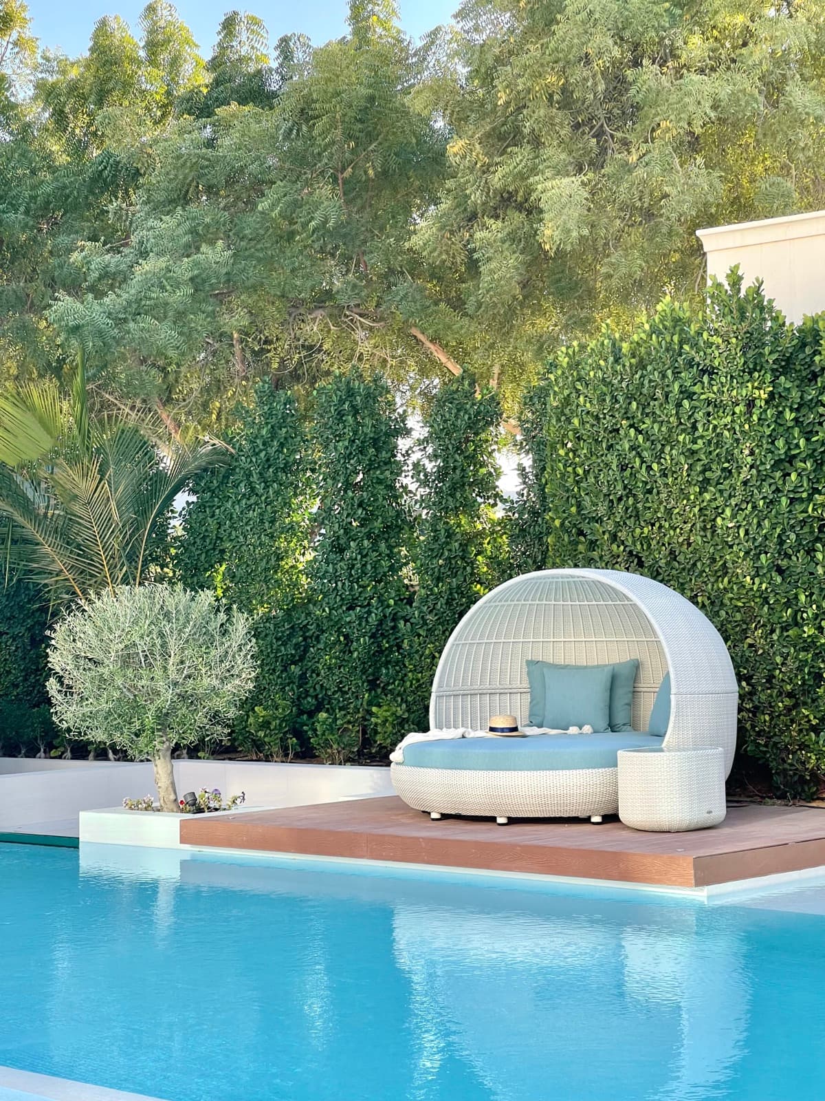 BLOOM LAGOON daybed beside a private pool at a villa in Emirates Hills, Dubai